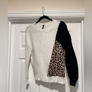 White and black sweater
